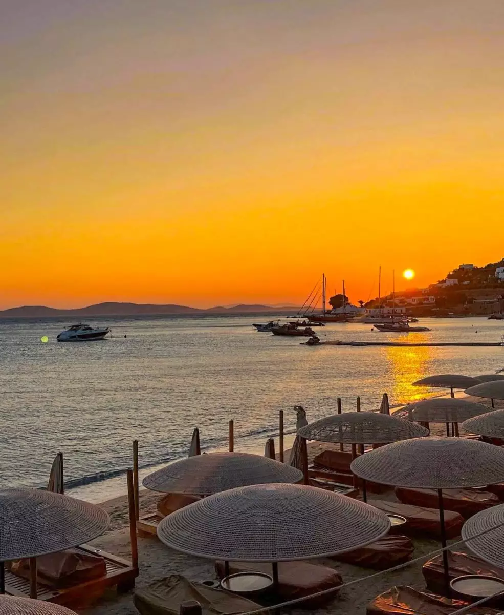 Stunning beachfront view at Hippie Fish Mykonos during sunset