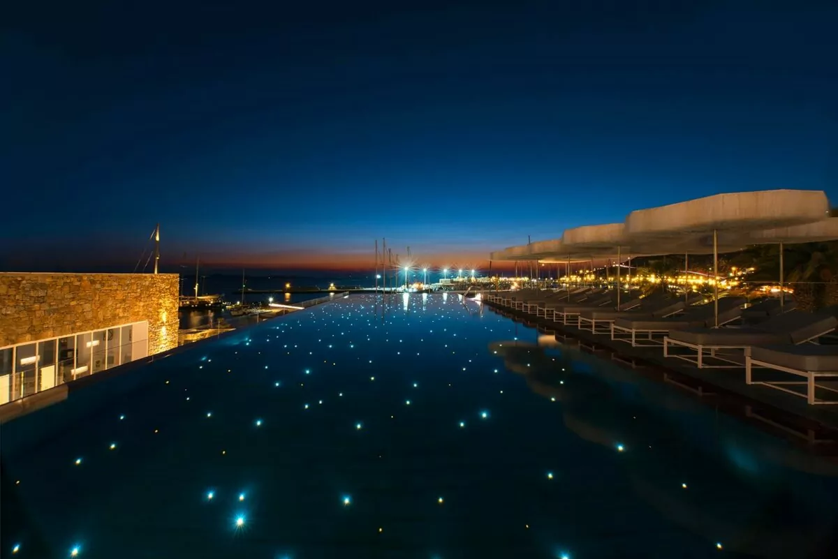 Luxury pool view at Riviera Hotel Mykonos during sunset